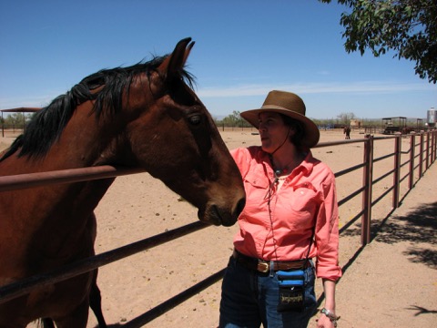 Wendy at fence with horse